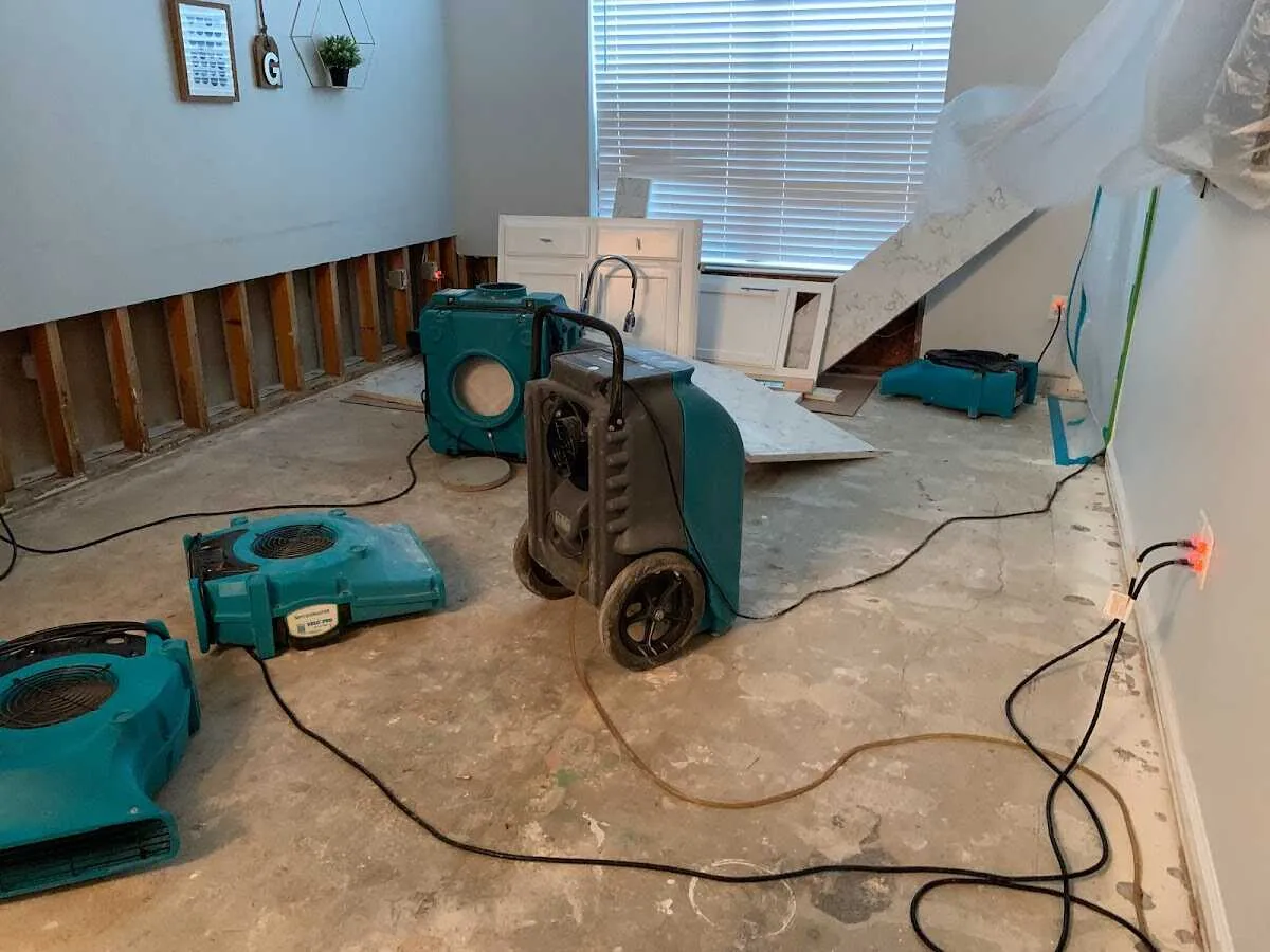 Dehumidifier in flood-cut room for Water Damage Restoration in Bensville